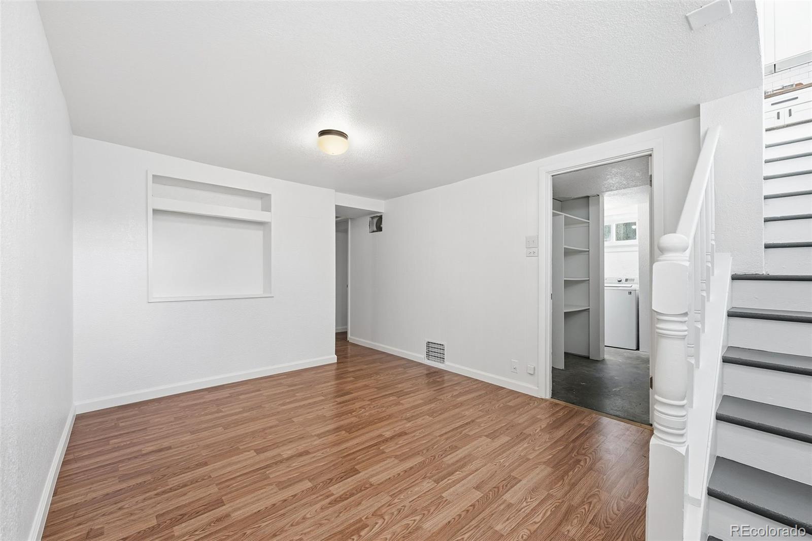 1661 Trenton Street Denver, CO 80220 - Photo 35 of 50 wooden floor in an empty room