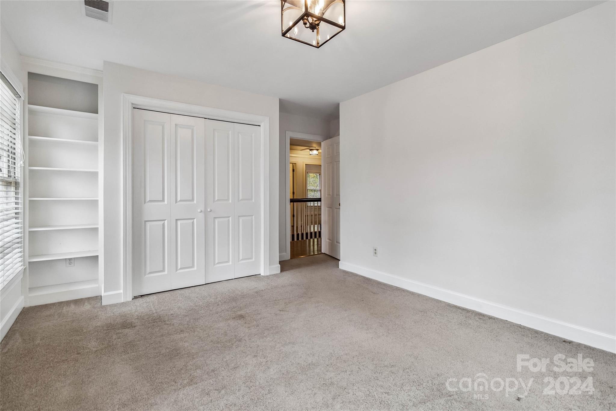 2410 Sharon Road Charlotte, NC 28211 - Photo 20 of 32 a view of an empty room with a closet