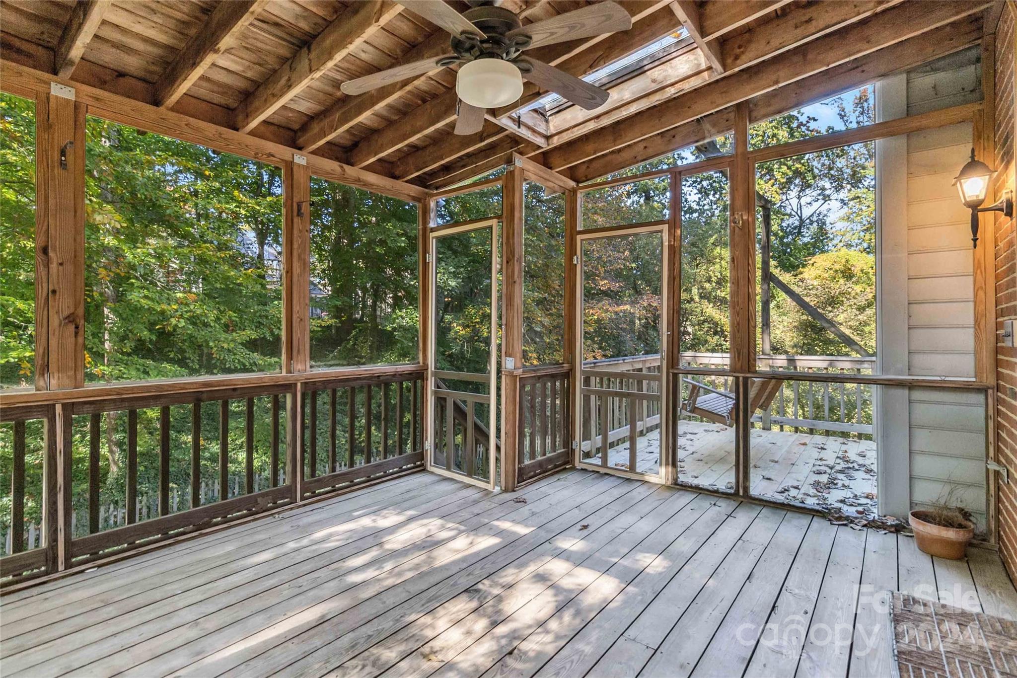 2410 Sharon Road Charlotte, NC 28211 - Photo 26 of 32 a view of porch with wooden floor