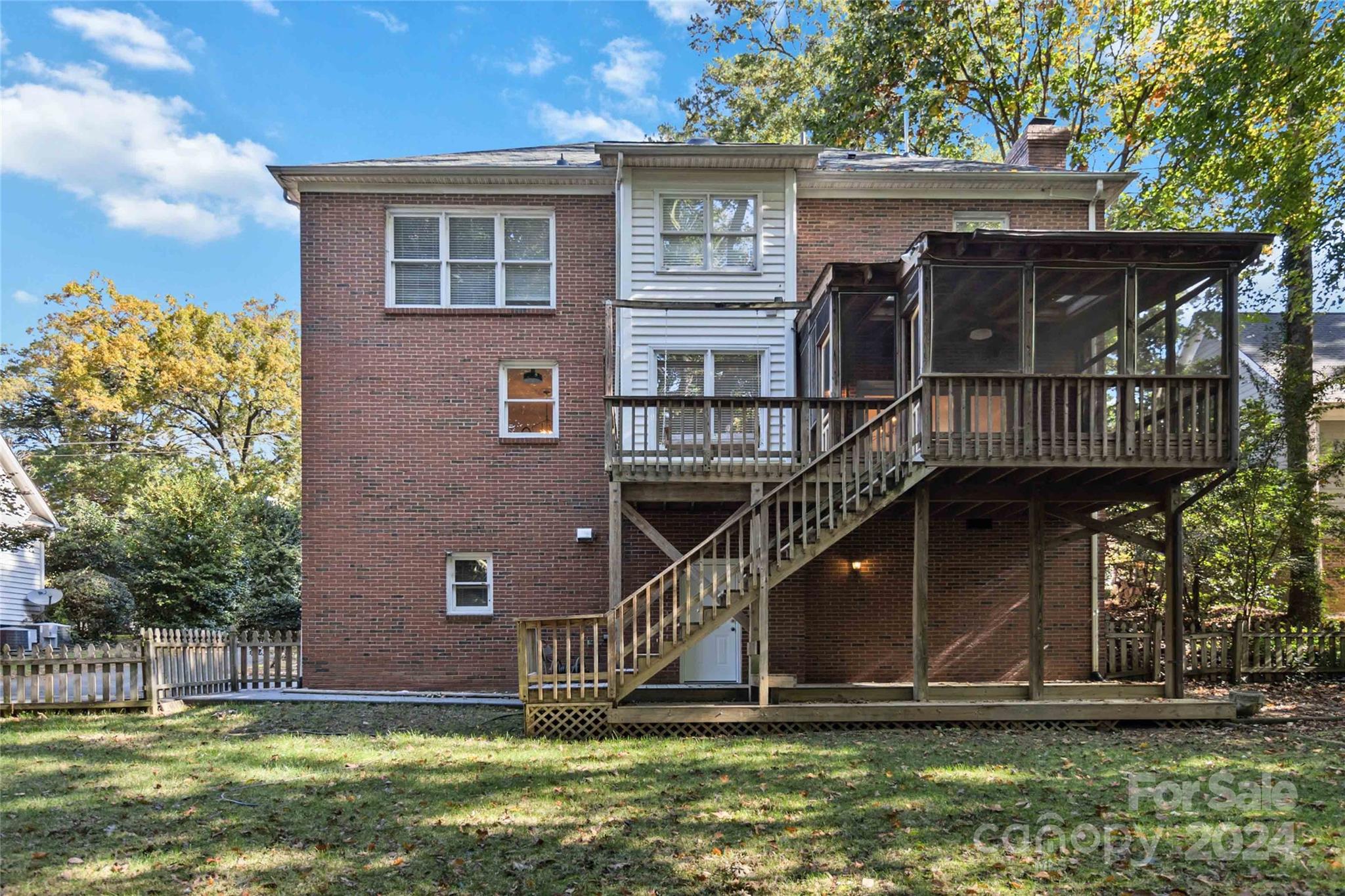2410 Sharon Road Charlotte, NC 28211 - Photo 27 of 32 a view of a house with a small yard