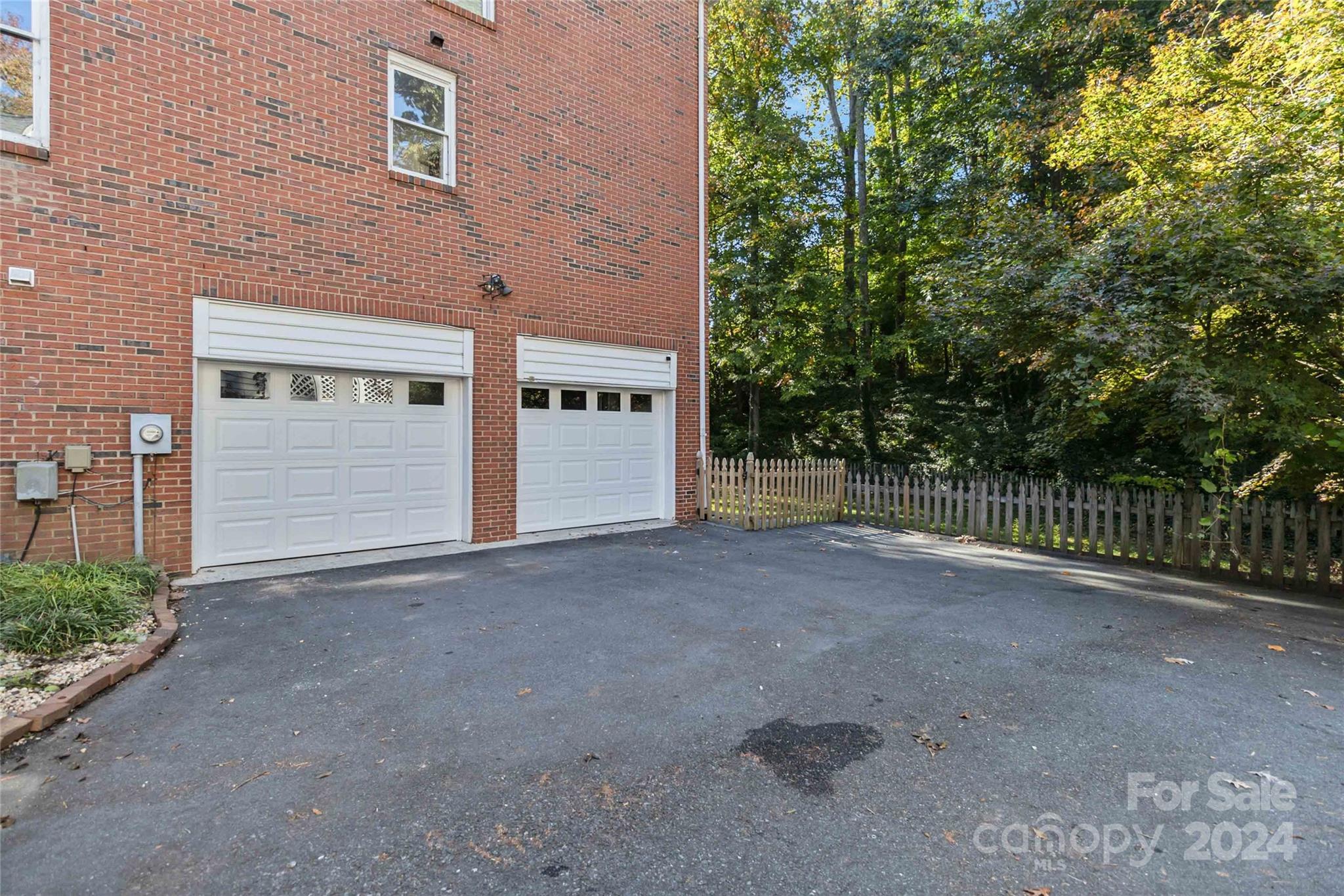 2410 Sharon Road Charlotte, NC 28211 - Photo 28 of 32 a view of a house with a street