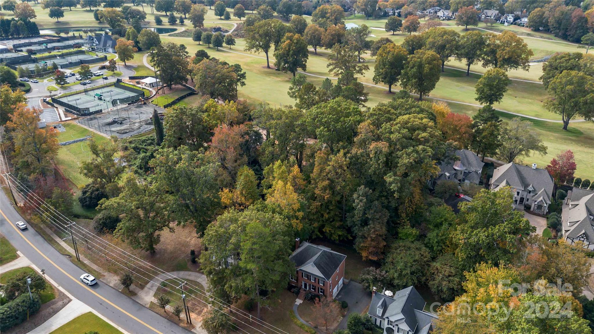 2410 Sharon Road Charlotte, NC 28211 - Photo 3 of 32 an aerial view of residential houses with outdoor space
