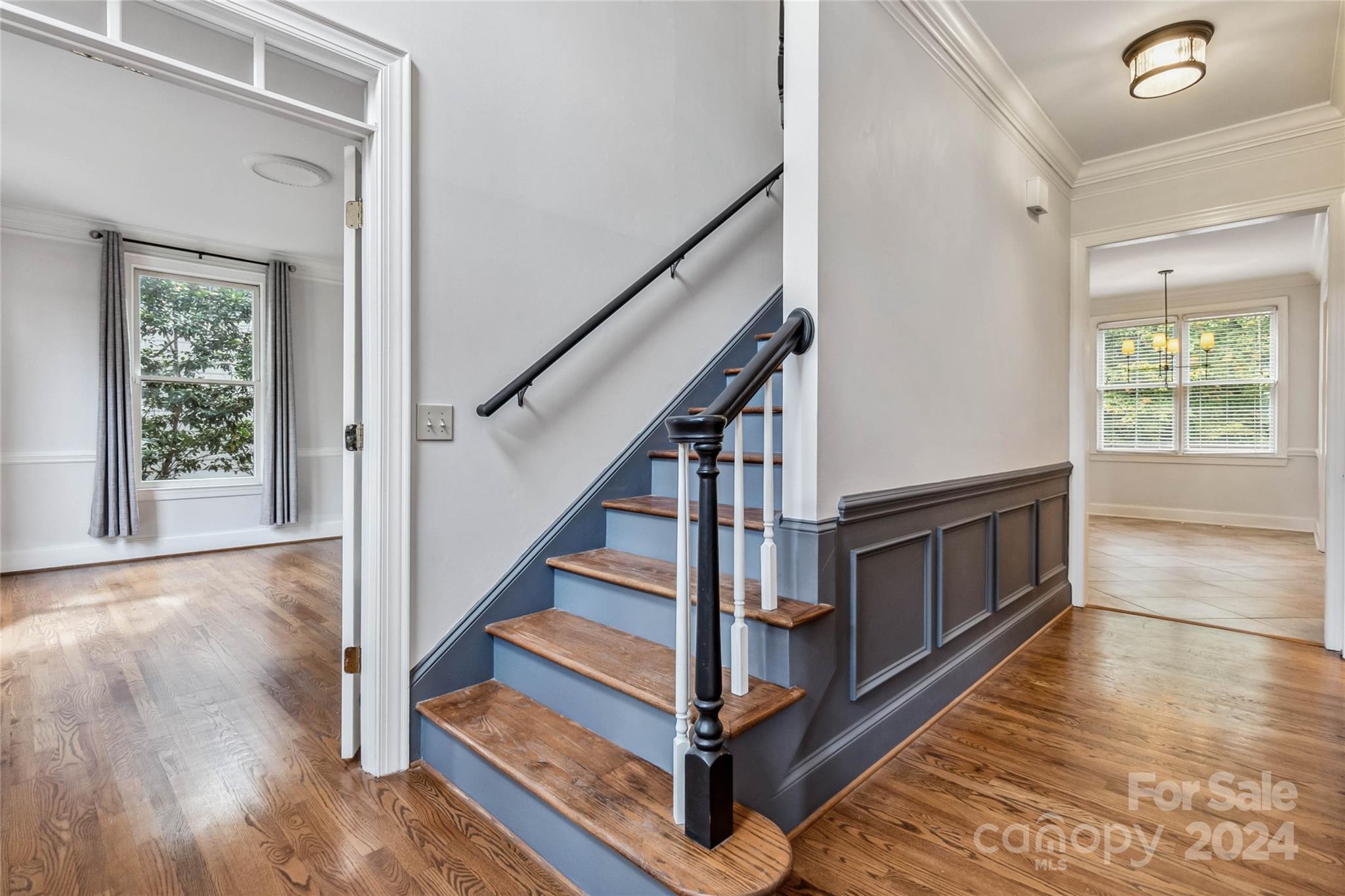 2410 Sharon Road Charlotte, NC 28211 - Photo 5 of 32 a view of entryway and hall with wooden floor