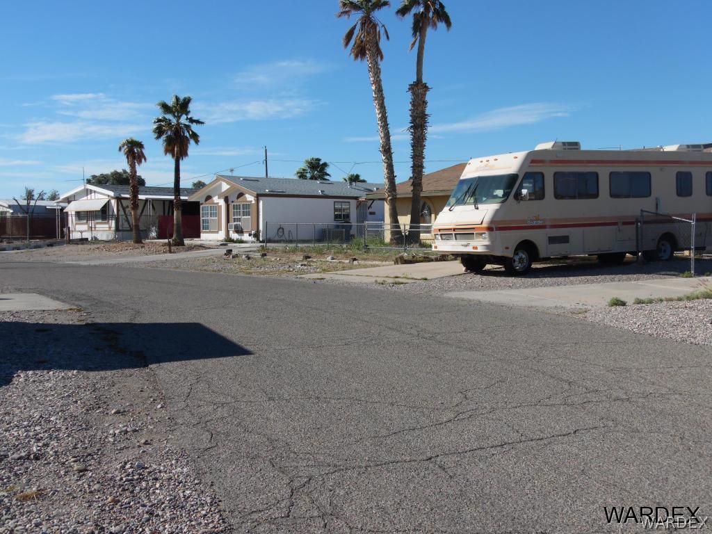 5654 Pasadena Road Fort Mohave, AZ 86426 - Photo 16 of 17 a car parked in front of a house