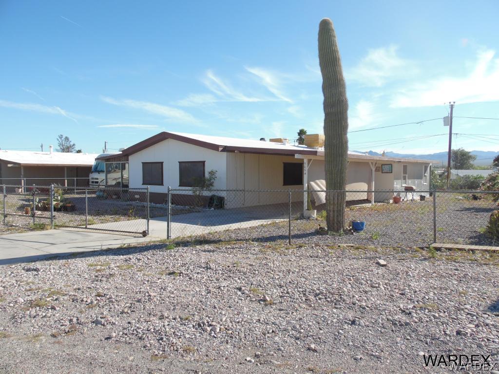 5654 Pasadena Road Fort Mohave, AZ 86426 - Photo 2 of 17 a view of a backyard of the house