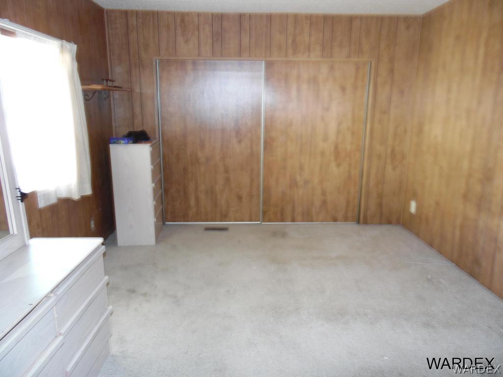 5654 Pasadena Road Fort Mohave, AZ 86426 - Photo 9 of 17 a view of an empty room and a bathroom