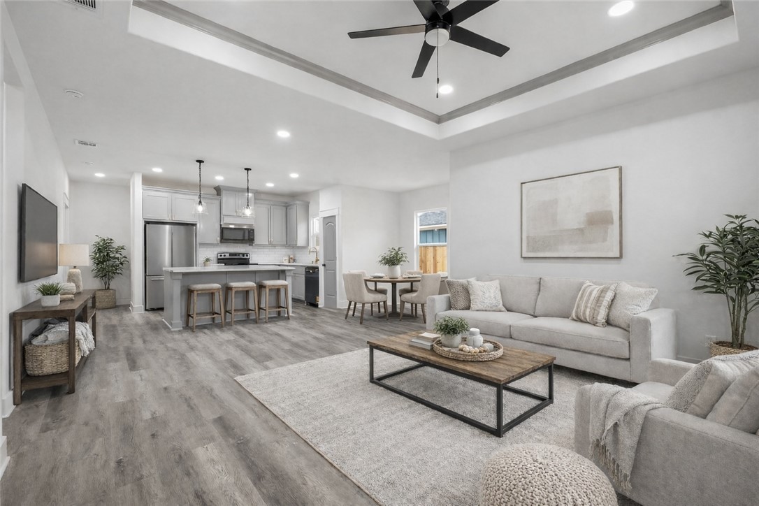 203 Lock Lane Bryan, TX 77803 - Photo 3 of 22 a living room with furniture and kitchen view
