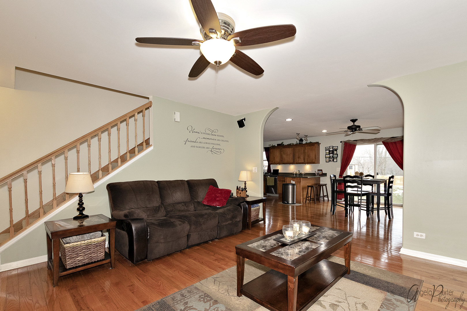 28659 West High Road Ingleside, IL 60041 - Photo 3 of 29 a living room with furniture kitchen view and a chandelier