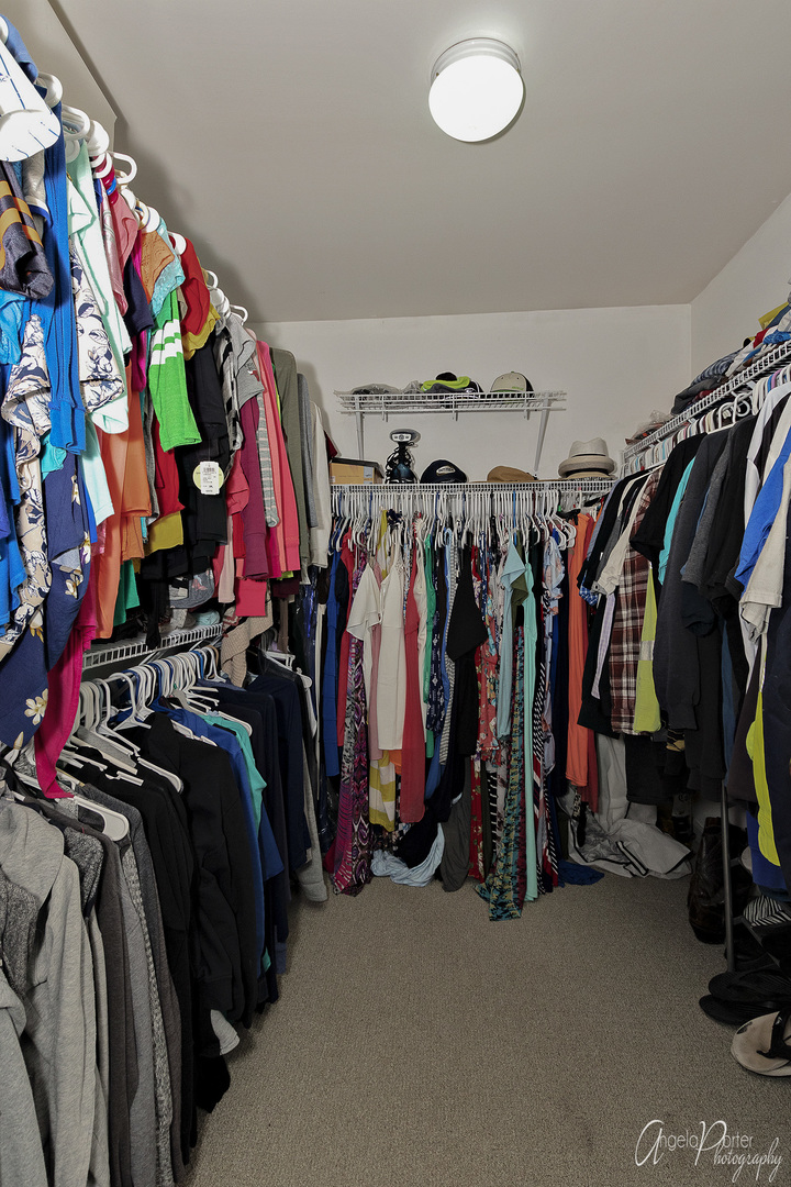 28659 West High Road Ingleside, IL 60041 - Photo 22 of 29 a view of walk in closet with clothes and shoes