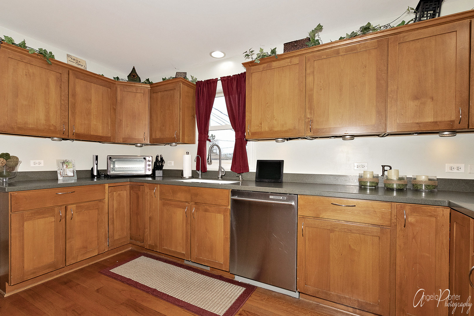 28659 West High Road Ingleside, IL 60041 - Photo 8 of 29 a kitchen with stainless steel appliances wooden cabinets a stove top oven a sink and dishwasher