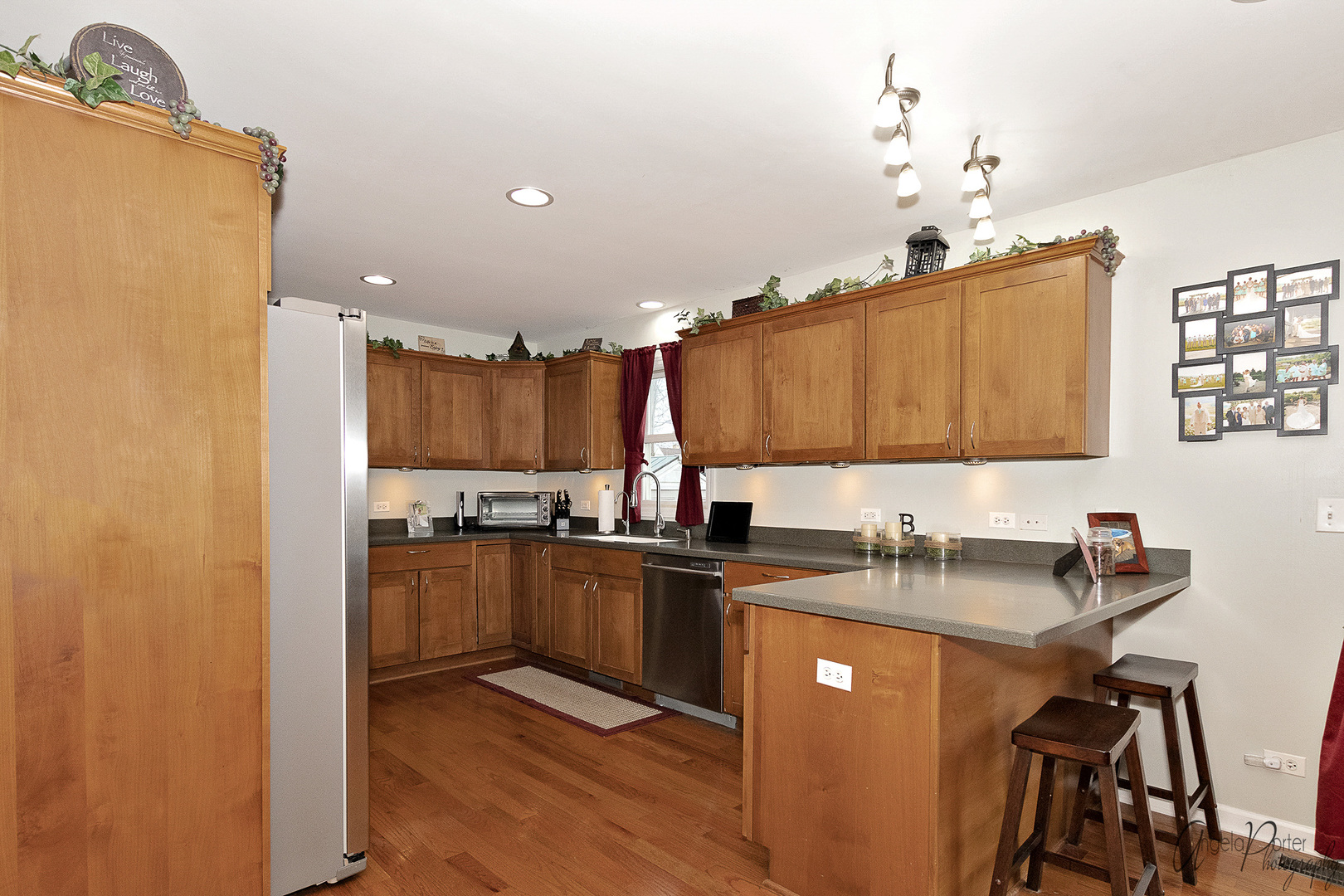 28659 West High Road Ingleside, IL 60041 - Photo 9 of 29 a kitchen with stainless steel appliances granite countertop a sink a stove and refrigerator