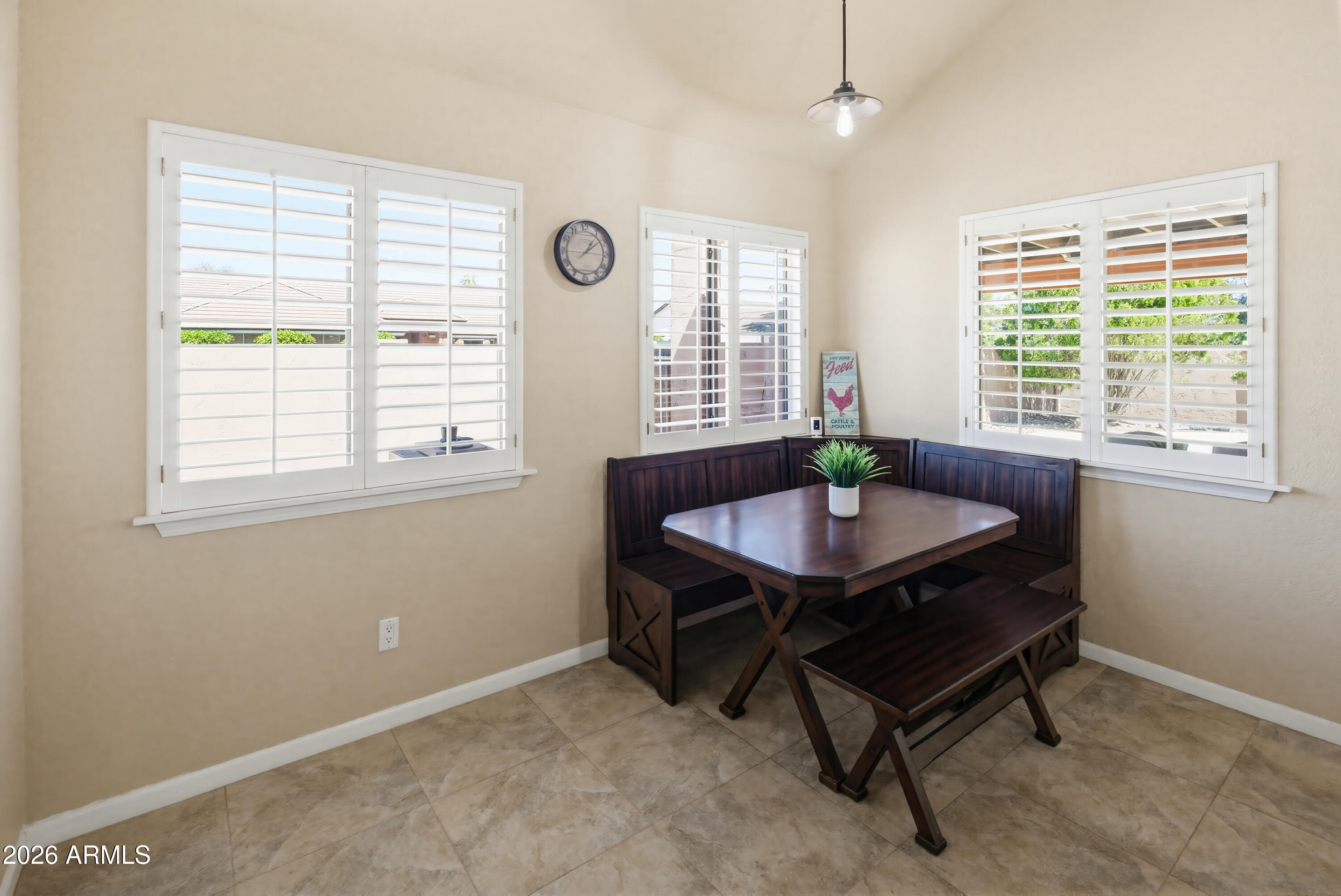 841 North Gentry Mesa, AZ 85213 - Photo 18 of 74 a view of a workspace with a window and dining table