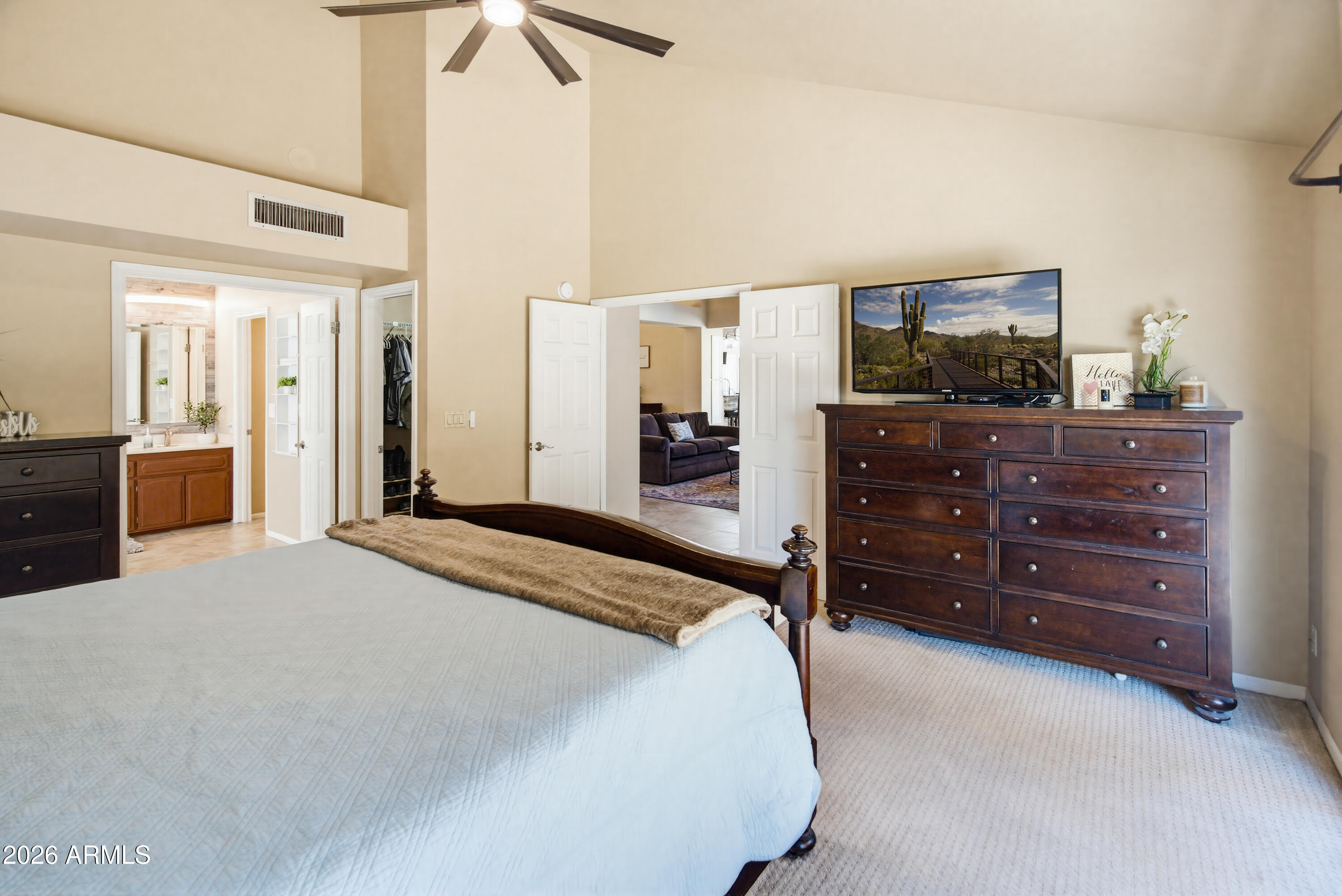 841 North Gentry Mesa, AZ 85213 - Photo 25 of 74 a bedroom with a bed and a dresser