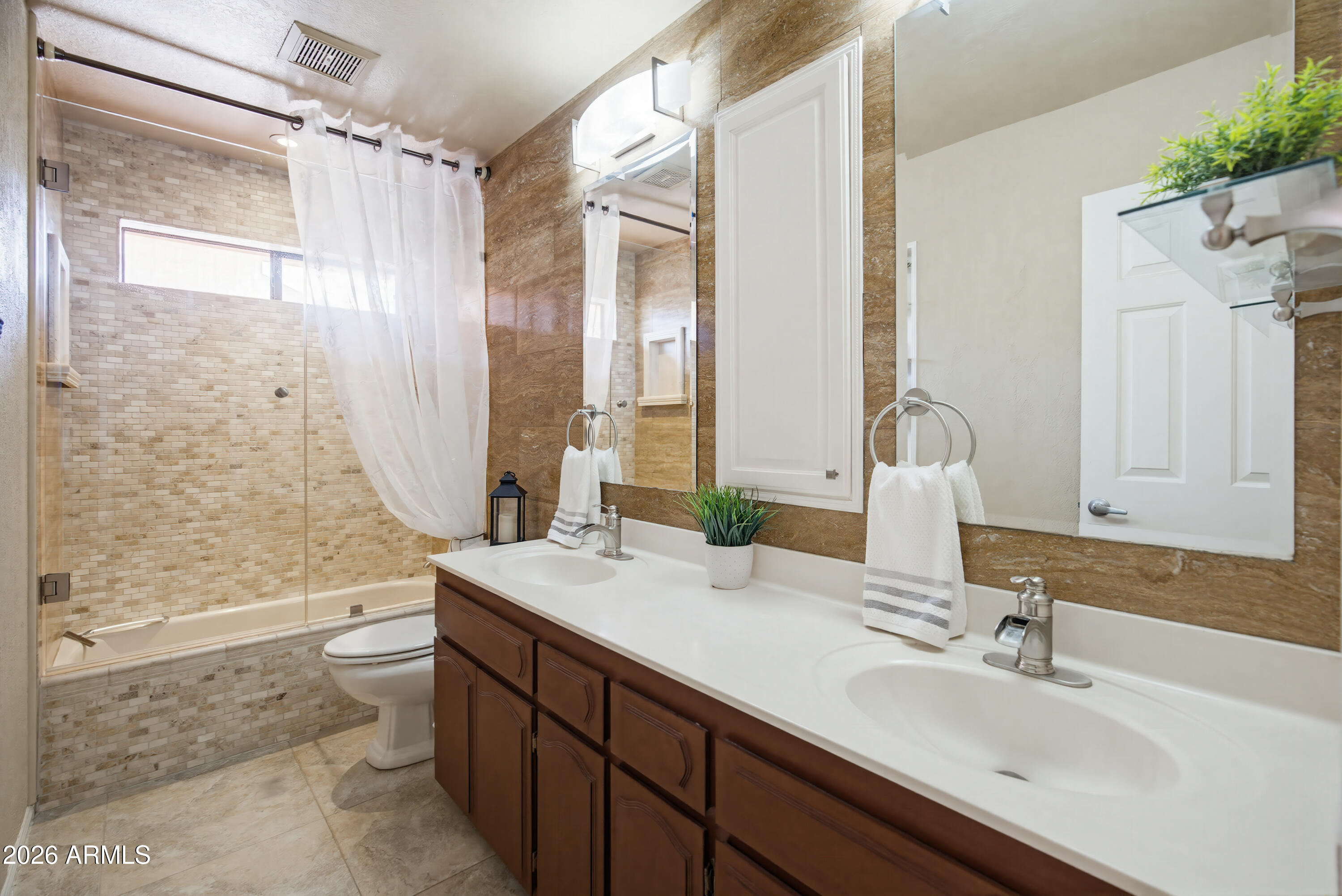 841 North Gentry Mesa, AZ 85213 - Photo 32 of 74 a bathroom with a sink double vanity mirror and a bathtub