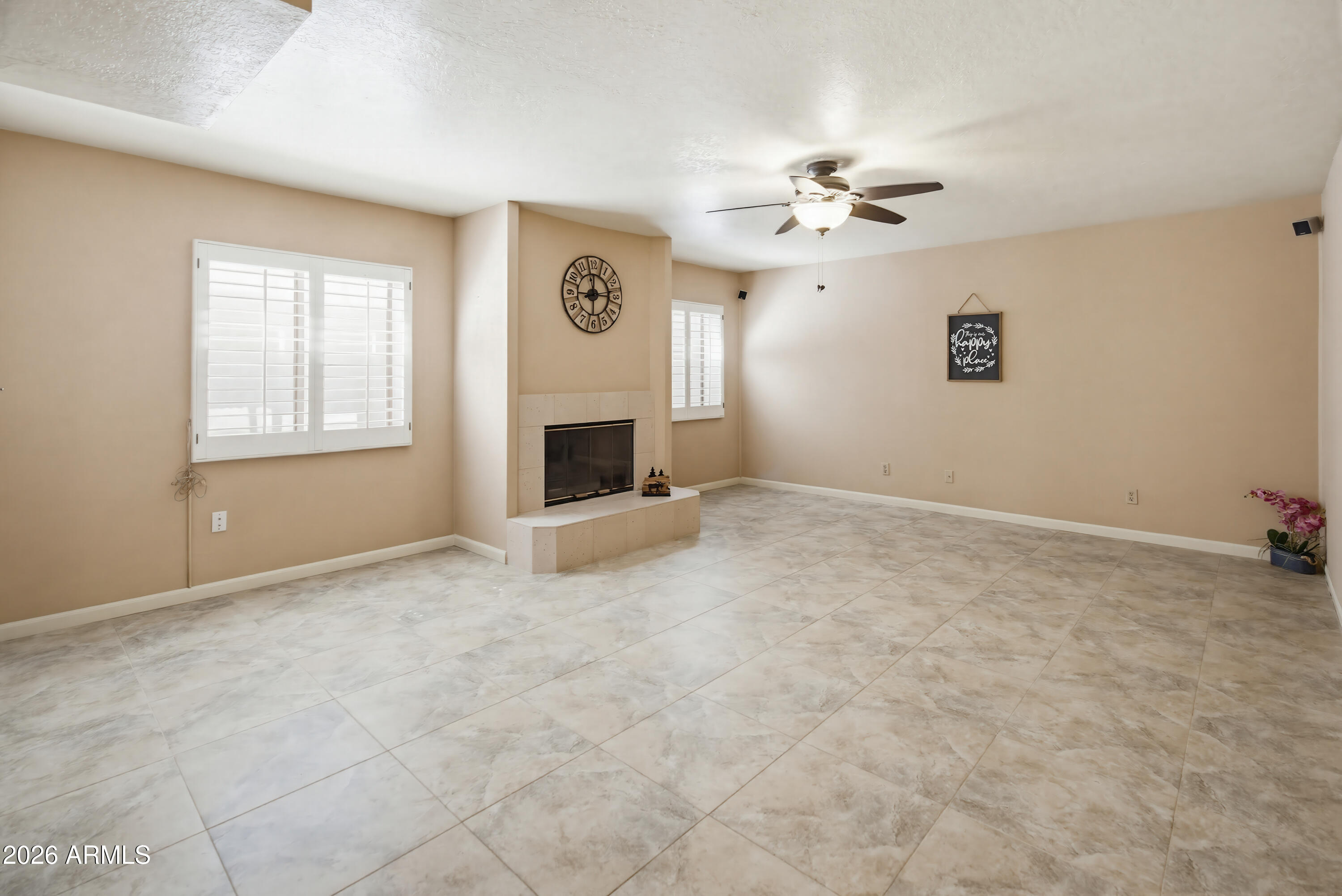 841 North Gentry Mesa, AZ 85213 - Photo 38 of 74 an empty room with windows and fan