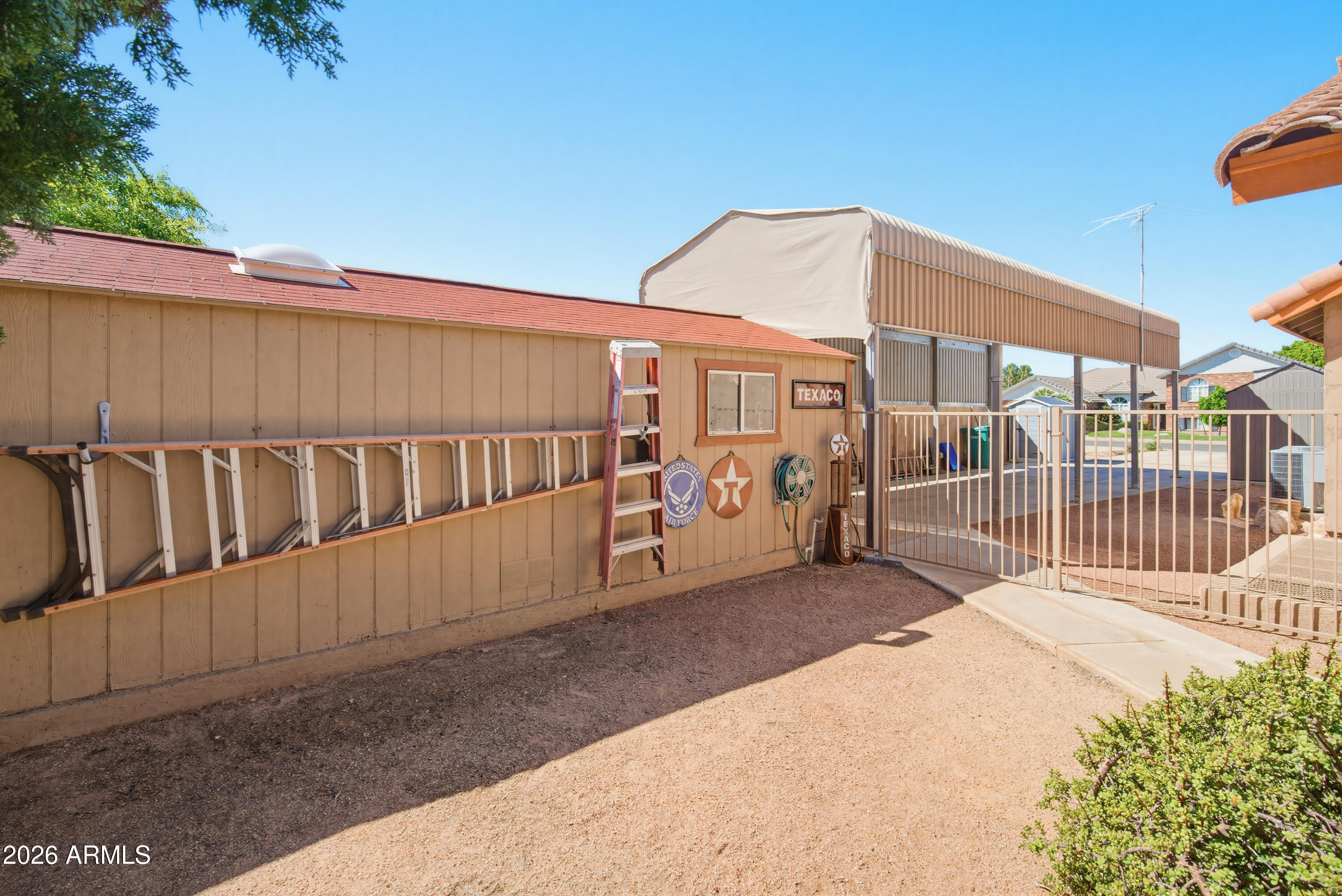 841 North Gentry Mesa, AZ 85213 - Photo 54 of 74 a view of a house with wooden fence
