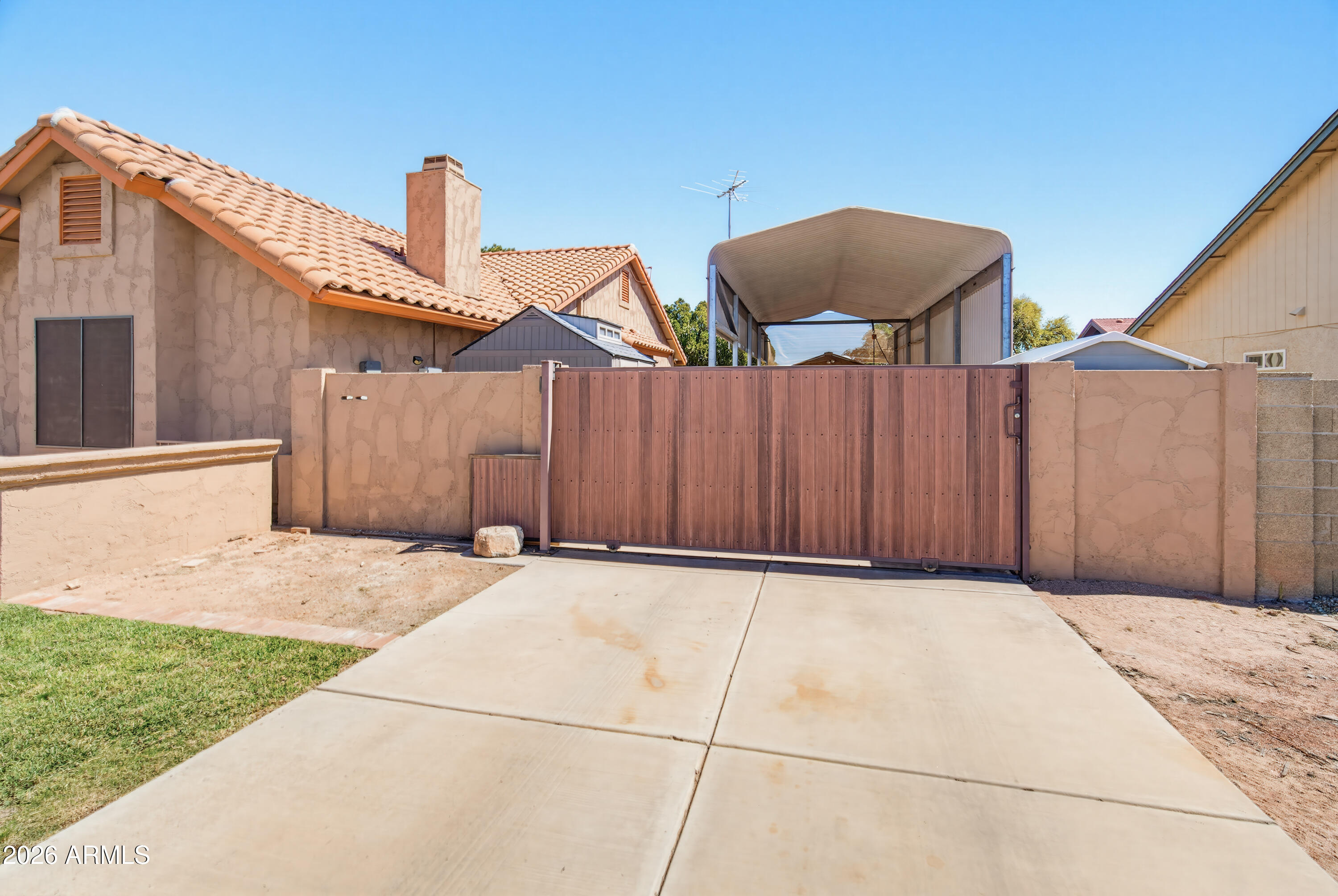 841 North Gentry Mesa, AZ 85213 - Photo 60 of 74 a backyard of a house with table and chairs