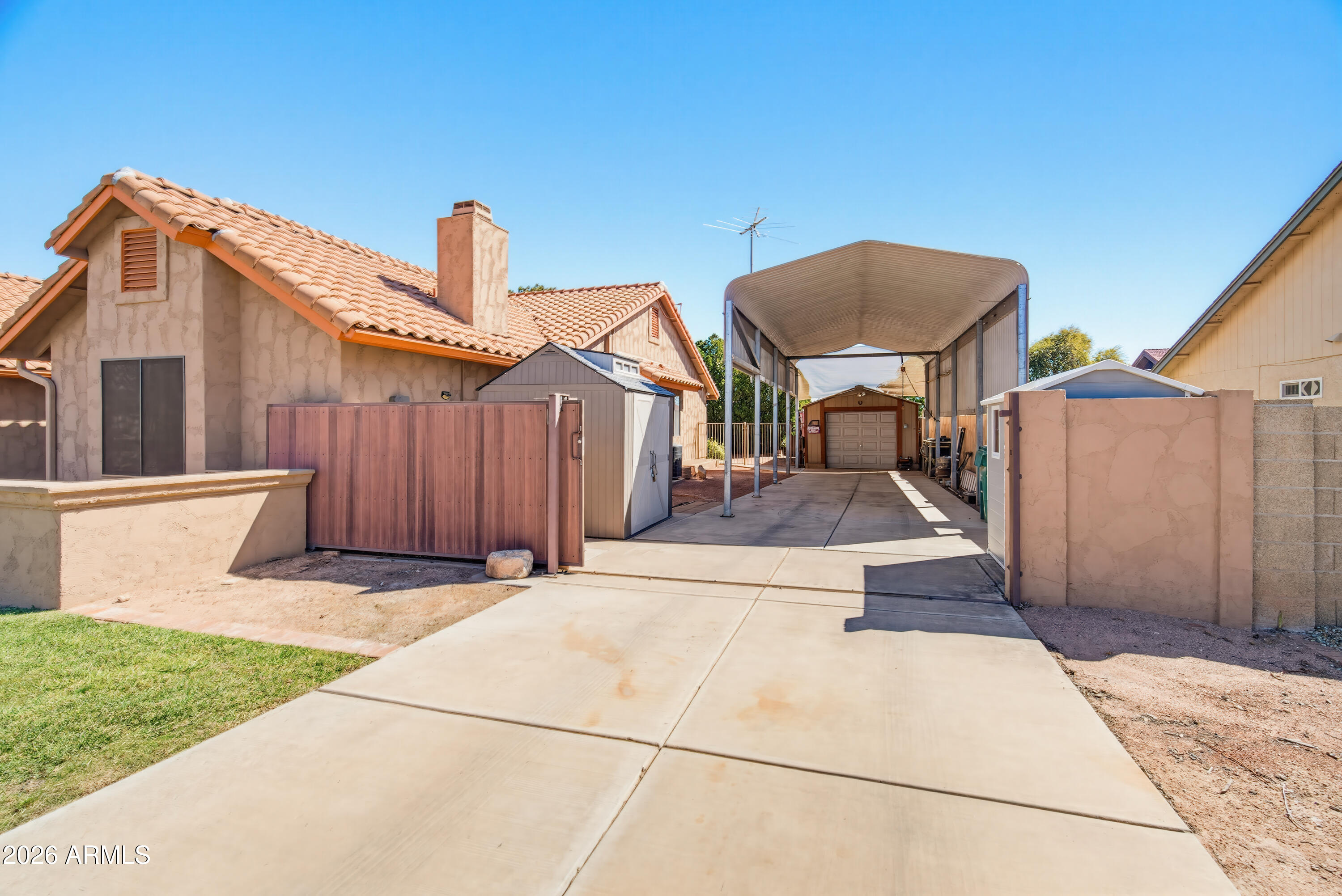 841 North Gentry Mesa, AZ 85213 - Photo 61 of 74 a front view of a house with garden