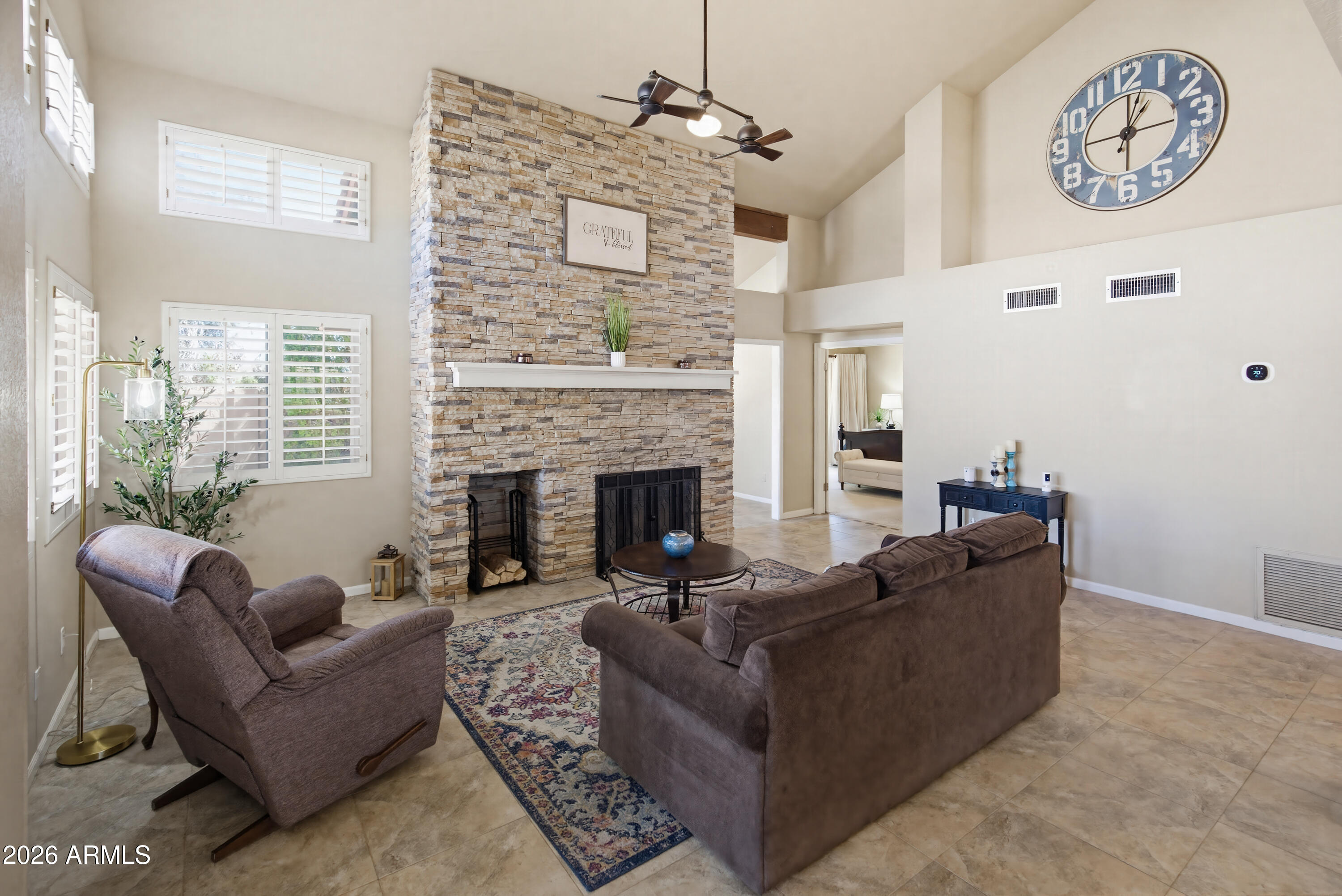 841 North Gentry Mesa, AZ 85213 - Photo 8 of 74 a living room with furniture and a fireplace