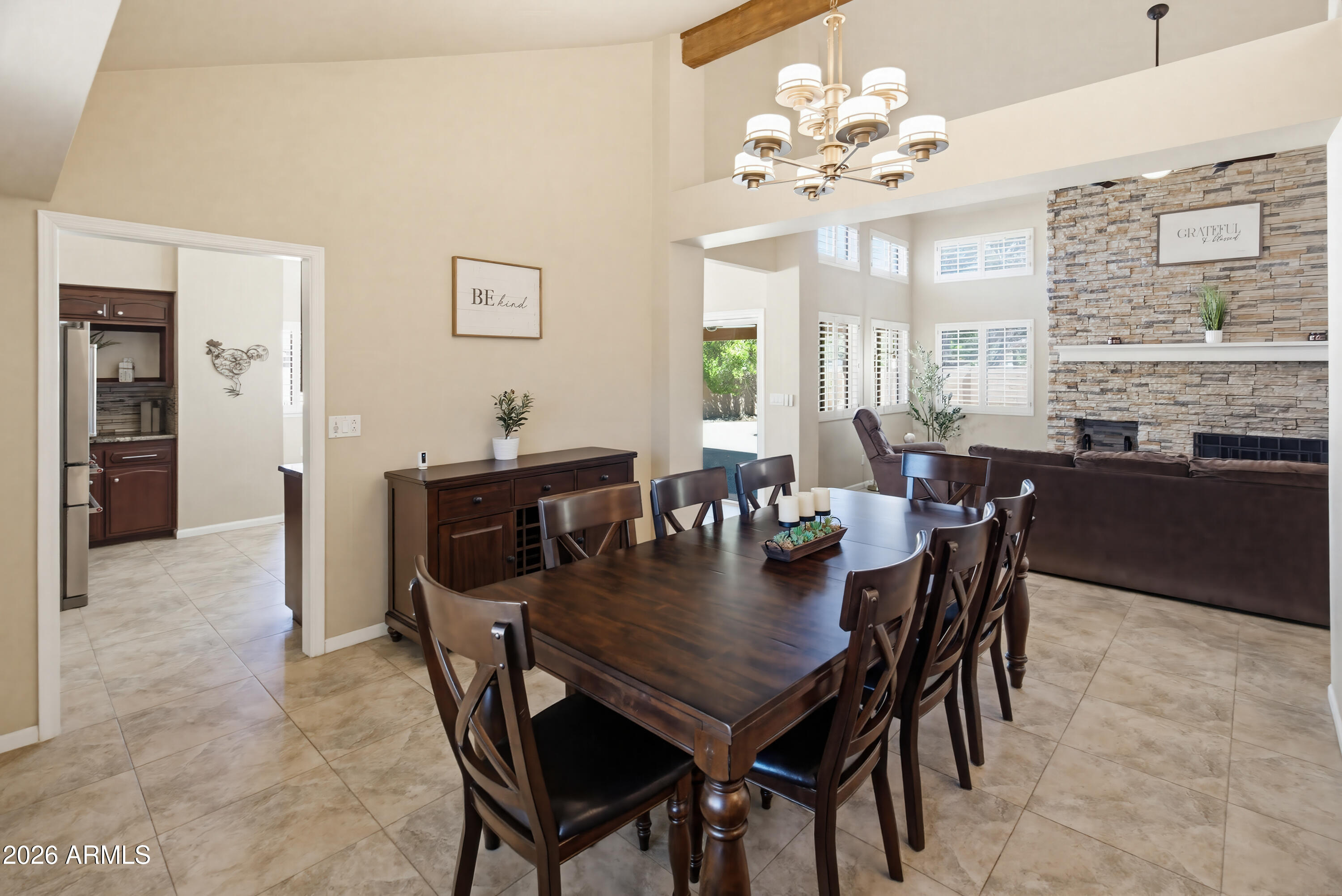 841 North Gentry Mesa, AZ 85213 - Photo 9 of 74 a view of a dining room with furniture and chandelier