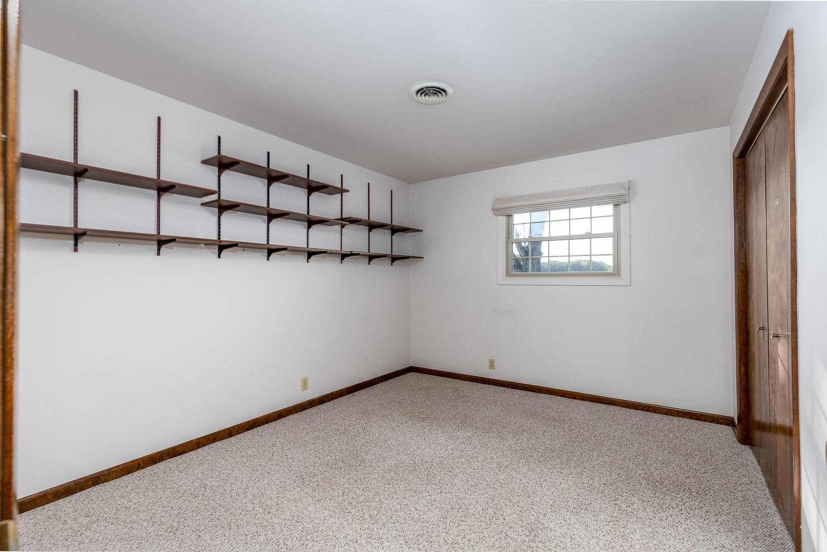 1526 East 18th Road Streator, IL 61364 - Photo 15 of 23 a view of a room with racks on the wall
