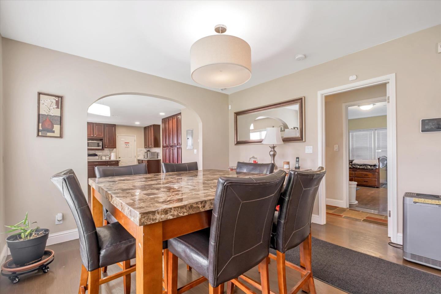 8245 Golf Links Road Oakland, CA 94605 - Photo 17 of 41 a dining room with furniture and window