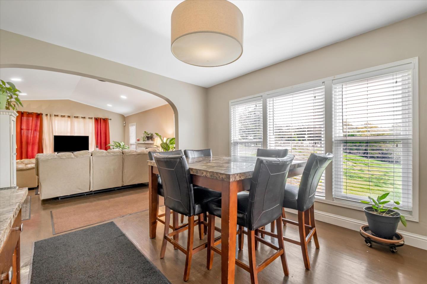 8245 Golf Links Road Oakland, CA 94605 - Photo 18 of 41 a view of a dining room with furniture and a large window