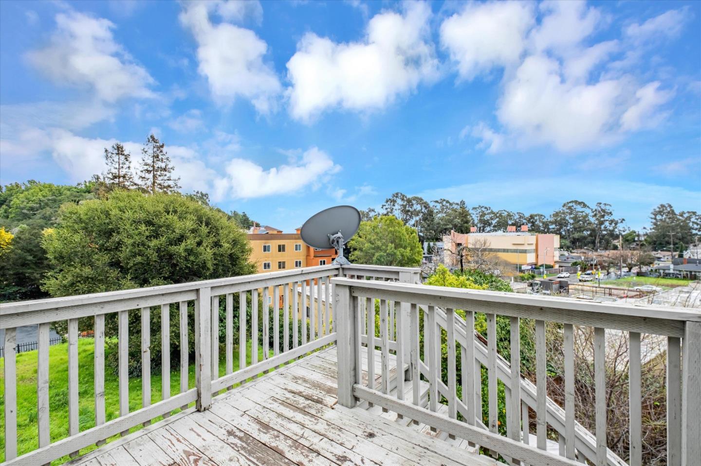 8245 Golf Links Road Oakland, CA 94605 - Photo 40 of 41 a view of a balcony with wooden fence