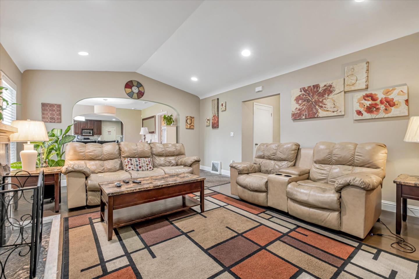 8245 Golf Links Road Oakland, CA 94605 - Photo 5 of 41 a living room with furniture and a rug