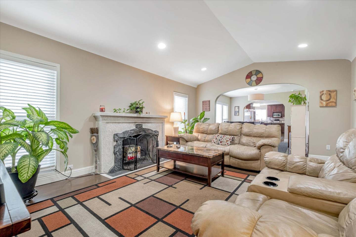 8245 Golf Links Road Oakland, CA 94605 - Photo 6 of 41 a living room with furniture and a fireplace