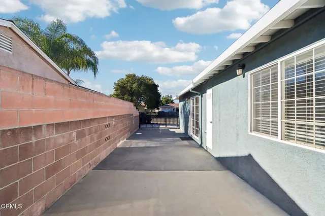 a view of a pathway with a building in the background