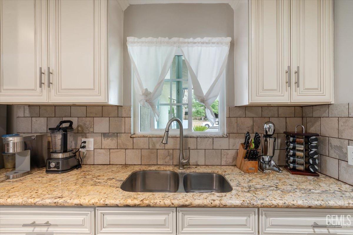 Undisclosed Address Bakersfield, CA 93309 - Photo 17 of 30 a kitchen with a sink and a window