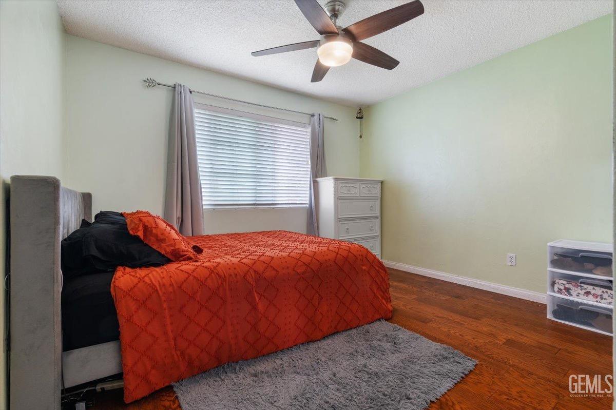 Undisclosed Address Bakersfield, CA 93309 - Photo 6 of 30 a bedroom with bed and a window