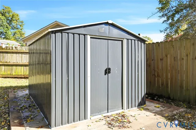 a front view of a house with a backyard
