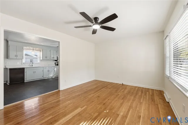 a view of cabinets and wooden floor