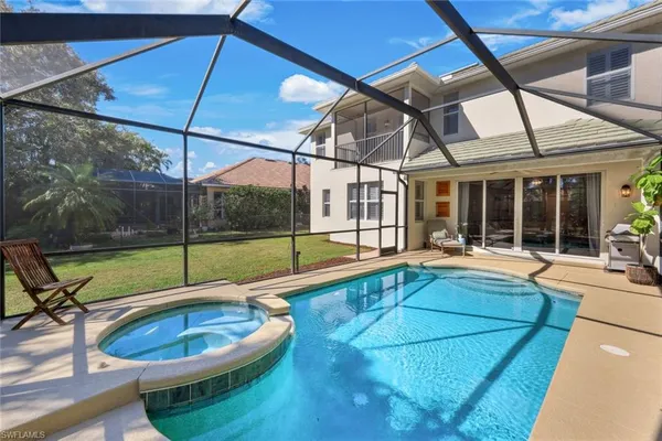a view of a house with swimming pool