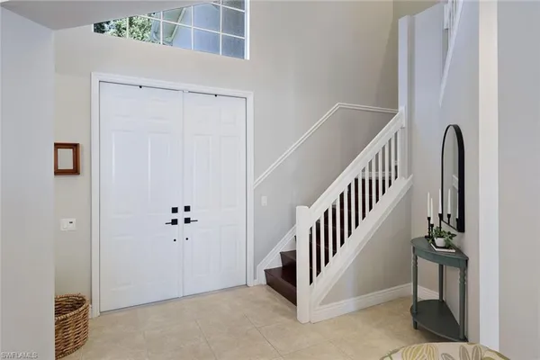 a view of a hallway with staircase