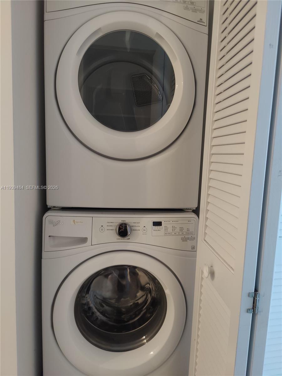 488 Northeast 18th Street, Unit 403 Miami, FL 33132 - Photo 13 of 13 a utility room with dryer and washer