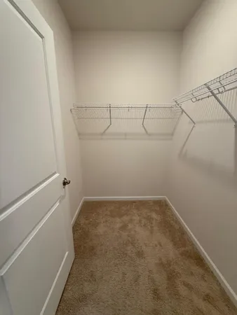 a view of a room with racks on the wall