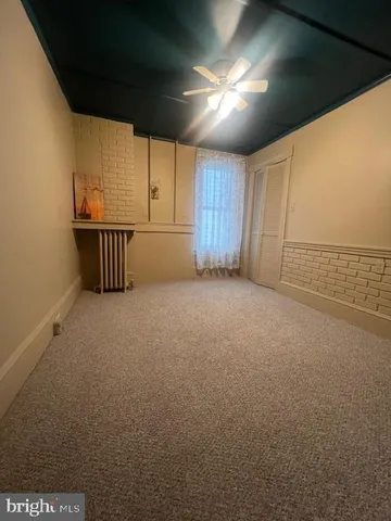 a view of a livingroom with furniture