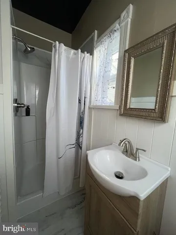 a kitchen with stainless steel appliances granite countertop a stove and a refrigerator