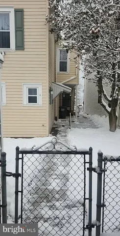 a backyard of a house with seating space