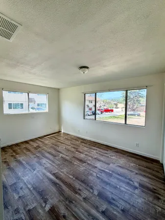 a view of an empty room and window