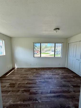 a view of an empty room and window