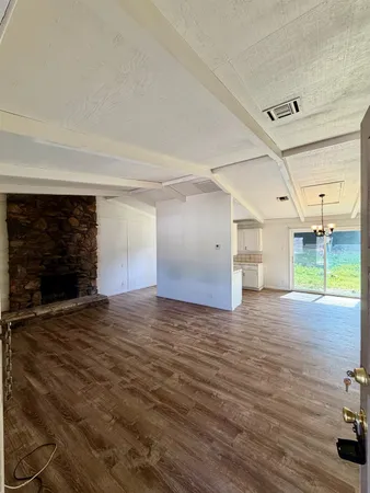 a view of an empty room and window