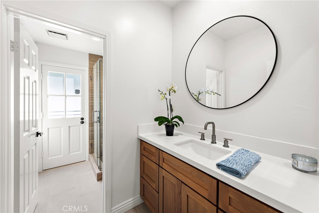 27552 Seascape Circle Dana Point, CA 92624 - Photo 15 of 39 a bathroom with a sink and a mirror