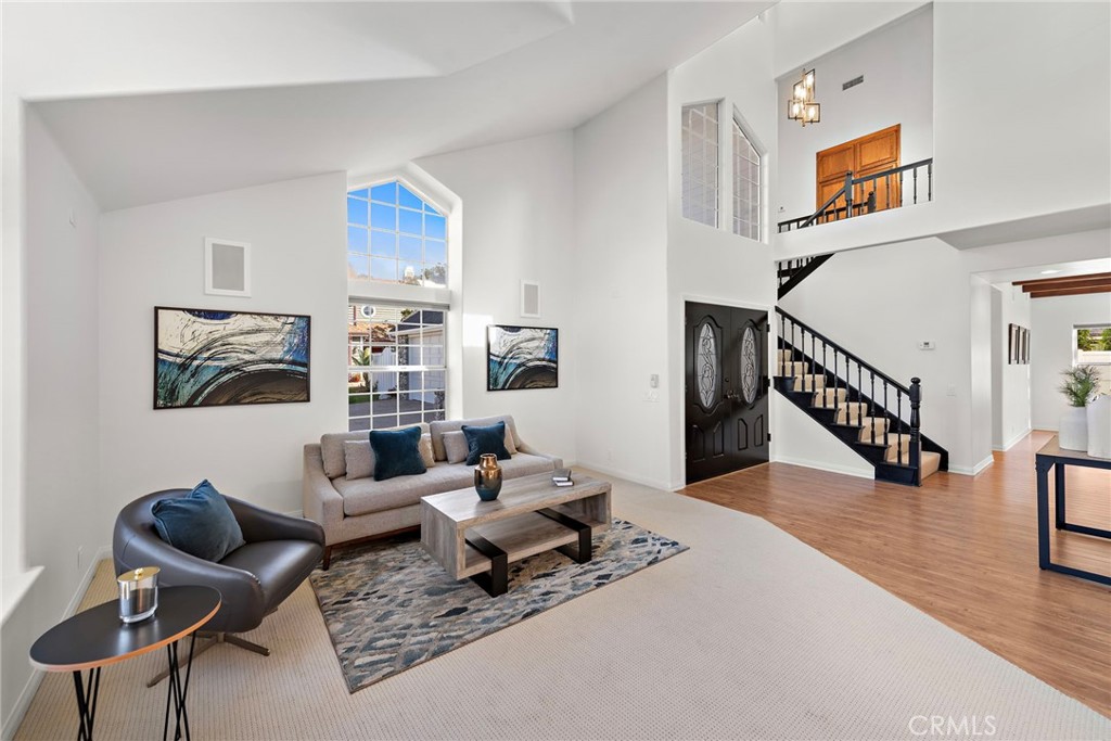 27552 Seascape Circle Dana Point, CA 92624 - Photo 2 of 39 a living room with furniture and wooden floor
