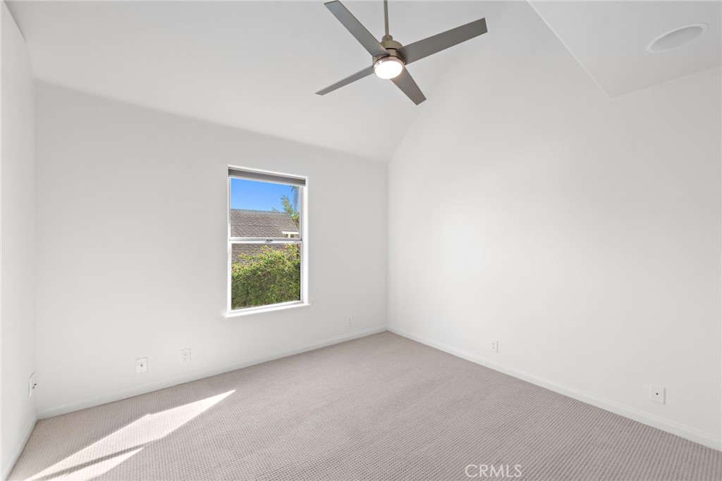 27552 Seascape Circle Dana Point, CA 92624 - Photo 27 of 39 an empty room with a window and a ceiling fan