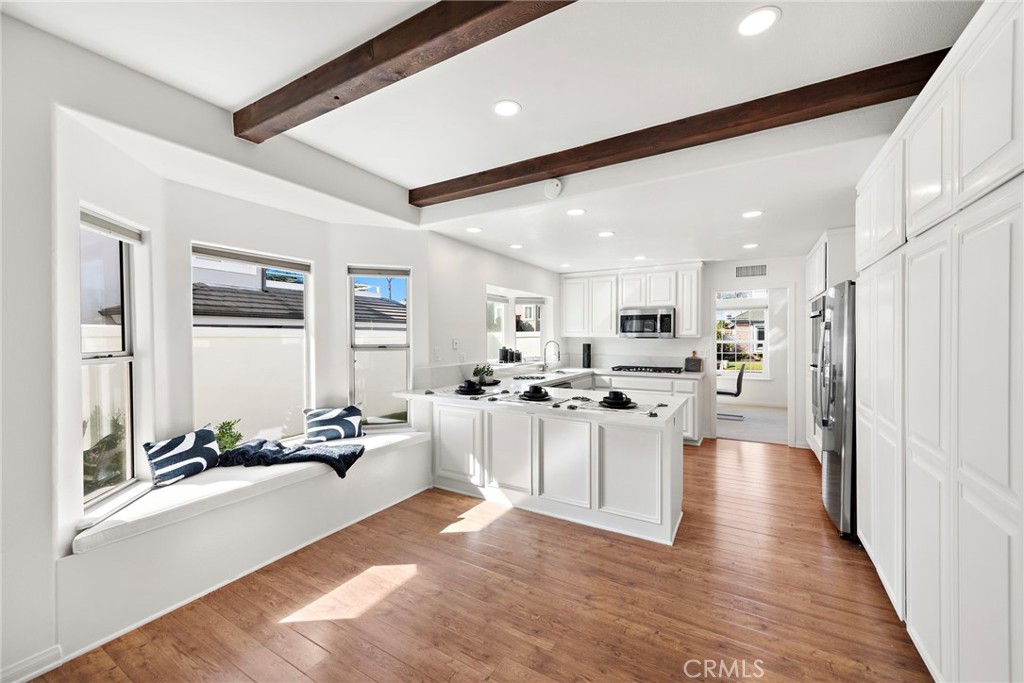 27552 Seascape Circle Dana Point, CA 92624 - Photo 8 of 39 a view of a living room kitchen and windows
