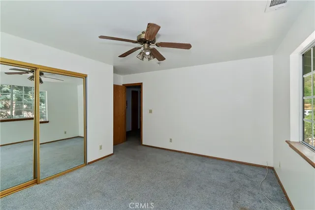 a view of empty room with windows